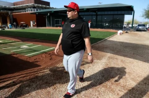 Cincinnati Reds minor-league pitching coordinator Kyle Boddy walks around the bullpen during spring practice.