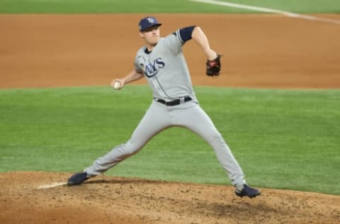 Oct 21, 2020; Arlington, Texas, USA; Tampa Bay Rays relief pitcher Peter Fairbanks (29) delivers a pitch in the 7th inning against the Los Angeles Dodgers in game two of the 2020 World Series at Globe Life Field. Mandatory Credit: Kevin Jairaj-USA TODAY Sports