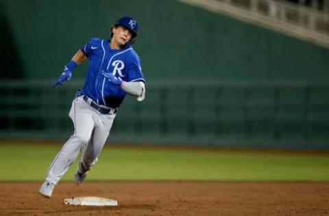 Kansas City Royals Bobby Witt Jr., rounds the bases on an error, inside the park home run, which was misplayed by Cincinnati Reds left fielder Errol Robinson in the eighth inning of the MLB Cactus League Spring Training game between the Cincinnati Reds and the Kansas City Royals at Goodyear Ballpark in Goodyear, Ariz., on Thursday, March 4, 2021. The Royals won 5-3 in a nine-inning game.Kansas City Royals At Cincinnati Reds Spring Training