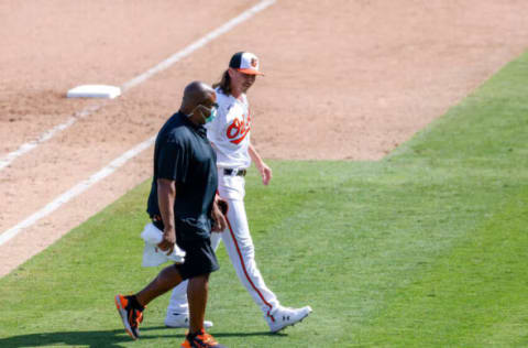 Pitcher Hunter Harvey throws one pitch in the top of the eighth inning before leaving with an injury during spring training. Nathan Ray Seebeck-USA TODAY Sports