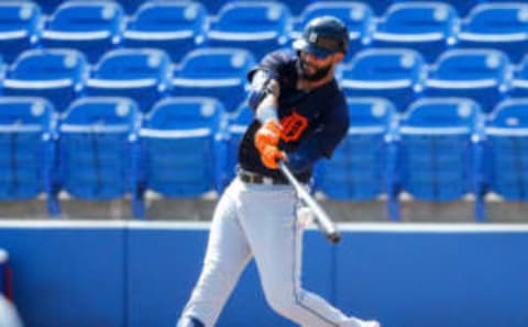 Mar 28, 2021: Detroit Tigers designated hitter Nomar Mazara hits a two-run home run: Nathan Ray Seebeck-USA TODAY Sports