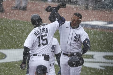 Detroit Tigers first baseman Miguel Cabrera celebrates with designated hitter Nomar Mazara. Raj Mehta-USA TODAY Sports