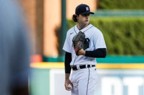 Detroit Tigers starting pitcher Casey Mize (12) looks on before delivering a pitch against Kansas City Royals during first inning at Comerica Park in Detroit on Wednesday, May 12, 2021.