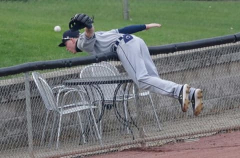 West Michigan Whitecaps outfielder Bryant Packard dives for a ball.