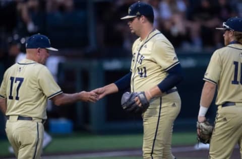 Georgia Tech pitcher Zach Maxwell (41) hands the ball over to head coach Danny Hall after facing two Vanderbilt batters in their game during the NCAA Division I Baseball Regionals at Hawkins Field Saturday, June 5, 2021 in Nashville, Tenn.Nas Vandy Gatech 014