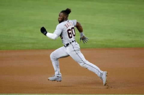 Jul 7, 2021; Arlington, Texas, USA; Detroit Tigers center fielder Akil Baddoo (60) runs to second base in the first inning against the Texas Rangers at Globe Life Field. Mandatory Credit: Tim Heitman-USA TODAY Sports