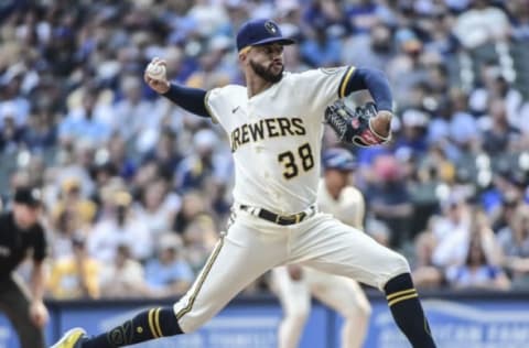 Aug 4, 2021; Milwaukee, Wisconsin, USA; Milwaukee Brewers pitcher Devin Williams (38) pitches in the ninth inning during the game against the Pittsburgh Pirates at American Family Field. Mandatory Credit: Benny Sieu-USA TODAY Sports