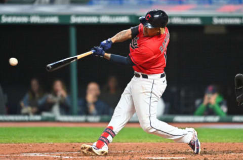 Sep 24, 2021; Cleveland, Ohio, USA; Cleveland Indians third baseman Jose Ramirez (11) hits an RBI single during the sixth inning against the Chicago White Sox at Progressive Field. Mandatory Credit: Ken Blaze-USA TODAY Sports