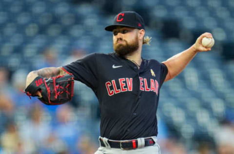 Sep 1, 2021; Kansas City, Missouri, USA; Cleveland Indians starting pitcher Logan Allen (54) pitches against the Kansas City Royals during the first inning at Kauffman Stadium. Mandatory Credit: Jay Biggerstaff-USA TODAY Sports