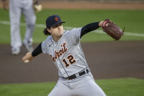 Sep 29, 2021; Minneapolis, Minnesota, USA; Detroit Tigers starting pitcher Casey Mize (12) throws a pitch in the first inning against the Minnesota Twins at Target Field. Mandatory Credit: Jesse Johnson-USA TODAY Sports