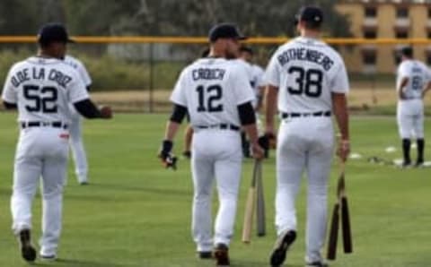 (From left) Tigers catching prospects Danuerys De La Cruz Josh Crouch and Mike Rothenberg walk to the next drill during practice at the spring training minor league minicamp Thursday, Feb.17, 2022 at Tiger Town in Lakeland, Florida.Tigers2