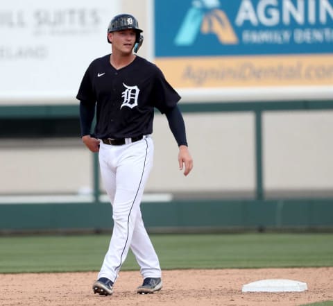 Detroit Tigers catcher Dillon Dingler doubles against Philadelphia Phillies reliever Tyler Cyr during sixth inning action at Publix Field at Joker Marchant Stadium on Friday, March 18, 2022, in Lakeland, Florida. (Detroit Free Press)