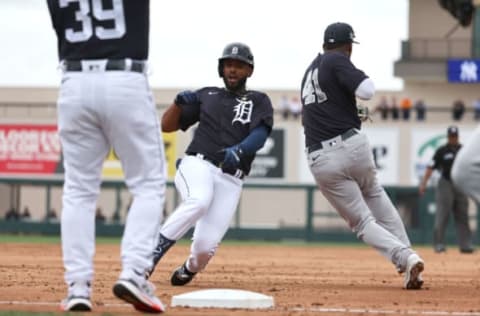 Mar 24, 2022; Lakeland, Florida, USA; Detroit Tigers infielder Jeimer Candelario (46) reaches third after hitting a triple during the second inning against the New York Yankees during spring training at Publix Field at Joker Marchant Stadium. Mandatory Credit: Kim Klement-USA TODAY Sports