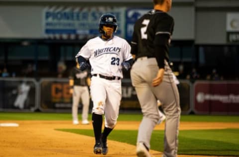 Whitecaps infielder Wenceel Perez runs to third against Lansing Tuesday, April 12, 2022, at LMCU Ballpark.Whitecaps Season Opener 35