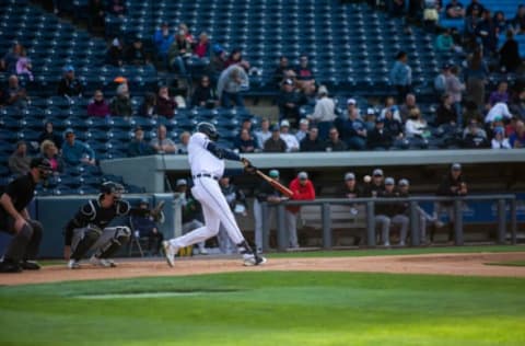 Whitecaps outfielder Parker Meadows takes a swing at the ball during the first inning against Lansing Tuesday, April 12, 2022, at LMCU Ballpark.Whitecaps Season Opener 7