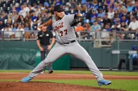 Jul 12, 2022; Kansas City, Missouri, USA; Detroit Tigers relief pitcher Joe Jimenez (77) delivers a pitch against the Kansas City Royals during the game at Kauffman Stadium. Mandatory Credit: Denny Medley-USA TODAY Sports