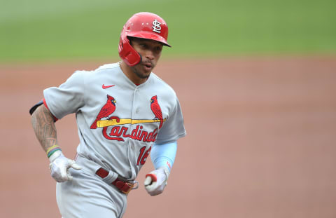 Second baseman Kolten Wong (16) circles the bases on a solo home run against the Pittsburgh Pirates during the first inning at PNC Park. Mandatory Credit: Charles LeClaire-USA TODAY Sports