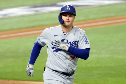 Joc Pederson (31) reacts after hitting a home run against the Tampa Bay Rays during the second inning during game five of the 2020 World Series at Globe Life Field. Mandatory Credit: Kevin Jairaj-USA TODAY Sports