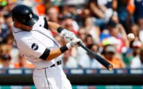 Apr 9, 2017; Detroit, MI, USA; Detroit Tigers second baseman Ian Kinsler (3) hits an RBI single in the second inning against the Boston Red Sox at Comerica Park. Mandatory Credit: Rick Osentoski-USA TODAY Sports