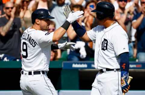 Apr 9, 2017; Detroit, MI, USA; Detroit Tigers third baseman Nicholas Castellanos (9) receives congratulations from first baseman Miguel Cabrera (24) after he hits a home run in the seventh inning against the Boston Red Sox at Comerica Park. Mandatory Credit: Rick Osentoski-USA TODAY Sports