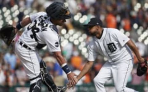 Apr 10, 2017; Detroit, MI, USA; Detroit Tigers catcher James McCann (34) and relief pitcher Francisco Rodriguez (57) celebrate after the game against the Minnesota Twins at Comerica Park. Detroit won 2-1. Mandatory Credit: Rick Osentoski-USA TODAY Sports