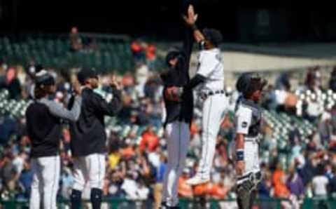 Apr 12, 2017; Detroit, MI, USA; Detroit Tigers shortstop Jose Iglesias (right) and pitcher Justin Verlander (left) celebrate after the game against the Minnesota Twins at Comerica Park. Detroit won 5-3. Mandatory Credit: Rick Osentoski-USA TODAY Sports