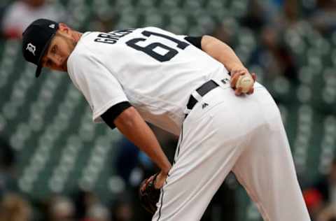 Apr 13, 2017; Detroit, MI, USA; Detroit Tigers relief pitcher Shane Greene (61) checks the runner at first during the eighth inning against the Minnesota Twins at Comerica Park. Mandatory Credit: Rick Osentoski-USA TODAY Sports