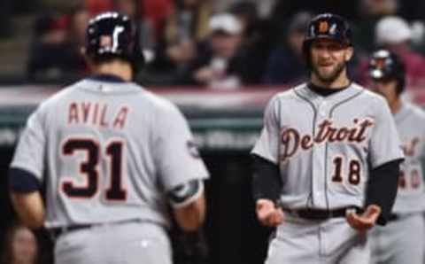 Apr 14, 2017; Cleveland, OH, USA; Detroit Tigers center fielder Tyler Collins (18) waits at home for catcher Alex Avila (31) after Avila’s home run during the sixth inning against the Cleveland Indians at Progressive Field. Mandatory Credit: Ken Blaze-USA TODAY Sports