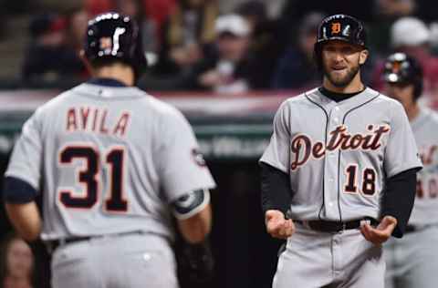 Apr 14, 2017; Cleveland, OH, USA; Detroit Tigers center fielder Tyler Collins (18) waits at home for catcher Alex Avila (31) after Avila’s home run during the sixth inning against the Cleveland Indians at Progressive Field. Mandatory Credit: Ken Blaze-USA TODAY Sports