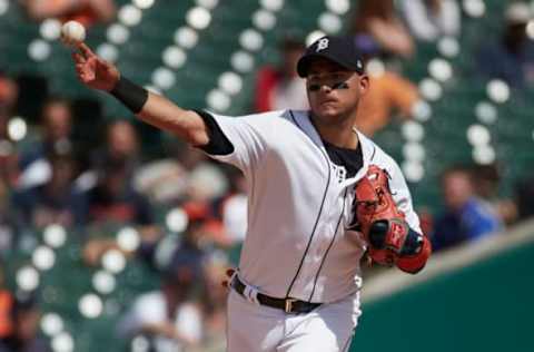 May 18, 2017; Detroit, MI, USA; Detroit Tigers shortstop Jose Iglesias (1) makes a throw to first during the seventh inning against the Baltimore Orioles at Comerica Park. Mandatory Credit: Rick Osentoski-USA TODAY Sports