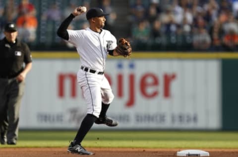 Jun 2, 2017; Detroit, MI, USA; Detroit Tigers shortstop Dixon Machado (49) throws the ball to first base for an out during the first inning against the Chicago White Sox at Comerica Park. Mandatory Credit: Raj Mehta-USA TODAY Sports