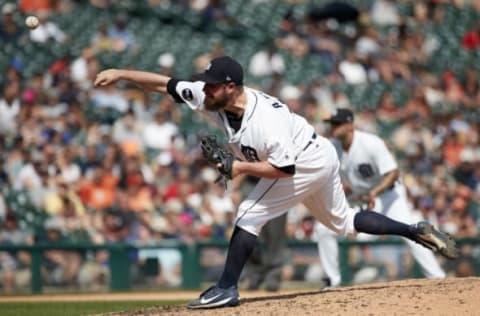 Jun 4, 2017; Detroit, MI, USA; Detroit Tigers relief pitcher Alex Wilson (30) pitches in the eighth inning against the Chicago White Sox at Comerica Park. Mandatory Credit: Rick Osentoski-USA TODAY Sports