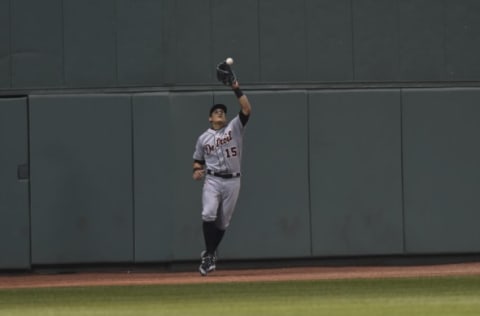 Jun 11, 2017; Boston, MA, USA; Detroit Tigers center fielder Mikie Mahtook (15) makes a catch for an out during the sixth inning against the Boston Red Sox at Fenway Park. Mandatory Credit: Bob DeChiara-USA TODAY Sports