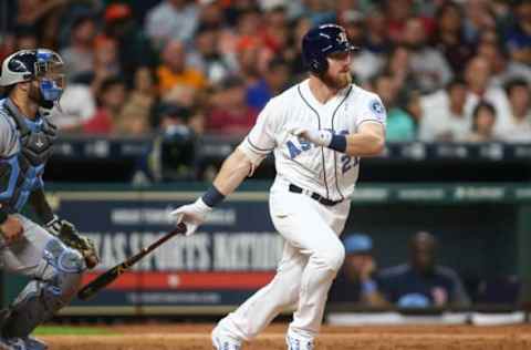 Jun 17, 2017; Houston, TX, USA; Houston Astros left fielder Derek Fisher (21) hits a single during the sixth inning against the Boston Red Sox at Minute Maid Park. Mandatory Credit: Troy Taormina-USA TODAY Sports