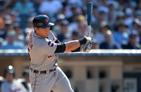 Jun 25, 2017; San Diego, CA, USA; Detroit Tigers center fielder Mikie Mahtook (15) hits a two RBI single during the ninth inning against the San Diego Padres at Petco Park. Mandatory Credit: Jake Roth-USA TODAY Sports