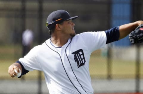 Feb 23, 2016; Lakeland, FL, USA; Detroit Tigers starting pitcher Joe Jimenez (77) warms up during the Detroit Tigers spring training camp at Joker Merchant Stadium. Mandatory Credit: Reinhold Matay-USA TODAY Sports