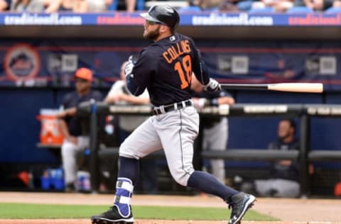 Mar 7, 2016; Port St. Lucie, FL, USA; Detroit Tigers left fielder Tyler Collins (18) connects for a base hit during a spring training game against the New York Mets at Tradition Field. Mandatory Credit: Steve Mitchell-USA TODAY Sports