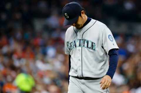 Jun 22, 2016; Detroit, MI, USA; Seattle Mariners starting pitcher Hisashi Iwakuma (18) walks off the field after being relieved in the fifth inning against the Detroit Tigers at Comerica Park. Mandatory Credit: Rick Osentoski-USA TODAY Sports