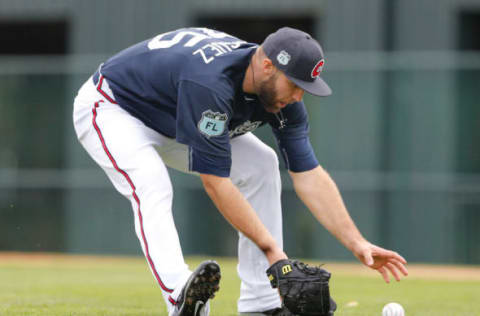 Feb 15, 2017; Lake Buena Vista, FL, USA; Atlanta Braves relief pitcher Paco Rodriguez (75) fields a bunted ball during MLB spring training workouts at Champion Stadium. Mandatory Credit: Reinhold Matay-USA TODAY Sports