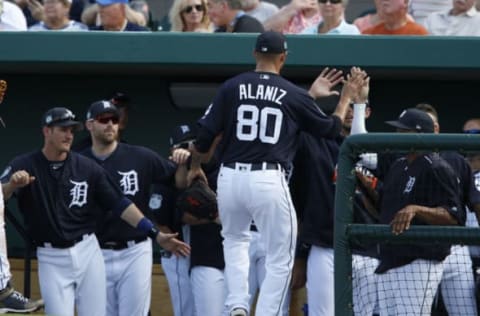 Feb 27, 2017; Lakeland, FL, USA; Detroit Tigers relief pitcher Ruben Alaniz (80) is congratulated by teammates after striking out the side in the sixth inning of a spring training baseball game against the Atlanta Braves at Joker Marchant Stadium. Mandatory Credit: Reinhold Matay-USA TODAY Sports