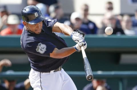 Mar 4, 2017; Lakeland, FL, USA; Detroit Tigers second baseman Omar Infante (4) hits a double that scored a run during the fourth inning of an MLB spring training baseball game against the New York Yankees at Joker Marchant Stadium. Mandatory Credit: Reinhold Matay-USA TODAY Sports