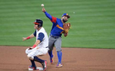 Mar 15, 2017; San Diego, CA, USA; United States infielder Ian Kinsler (3) is called safe at second base as Venezuela infielder Jose Altuve (27) throws to first base during the 2017 World Baseball Classic at Petco Park. The United States won 4-2. Mandatory Credit: Orlando Ramirez-USA TODAY Sports