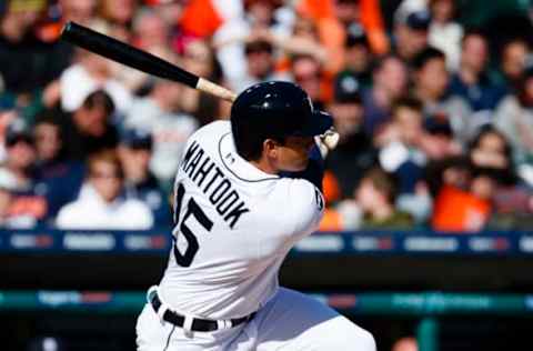 Apr 7, 2017; Detroit, MI, USA; Detroit Tigers center fielder Mikie Mahtook (15) hits an RBI double in the eighth inning against the Boston Red Sox at Comerica Park. Detroit won 6-5. Mandatory Credit: Rick Osentoski-USA TODAY Sports