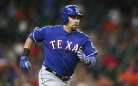 Sep 14, 2016; Houston, TX, USA; Texas Rangers designated hitter Carlos Beltran (36) hits an RBI double during the first inning against the Houston Astros at Minute Maid Park. Mandatory Credit: Troy Taormina-USA TODAY Sports