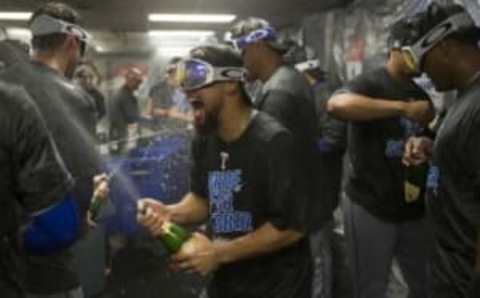 Sep 23, 2016; Oakland, CA, USA; Texas Rangers players celebrate in their locker room after clinching the AL West at Oakland Coliseum. The Rangers won 3-0. Mandatory Credit: Neville E. Guard-USA TODAY Sports