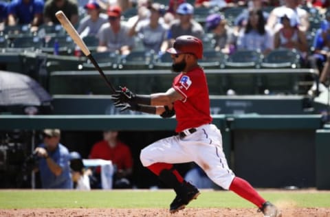 ARLINGTON, TX – JULY 22: Rougned Odor #12 of the Texas Rangers hits a run scoring single against the Cleveland Indians during the third inning at Globe Life Park in Arlington on July 22, 2018 in Arlington, Texas. (Photo by Ron Jenkins/Getty Images)