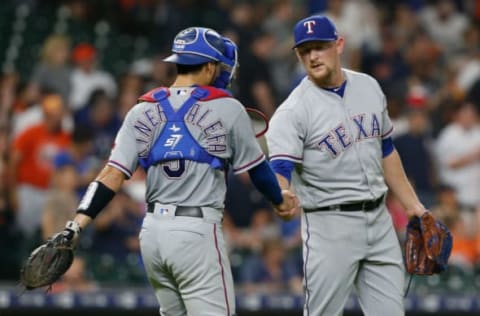 HOUSTON, TX – JULY 28: Isiah Kiner-Falefa #9 of the Texas Rangers shakes hands with Austin Bibens-Dirkx #56 after the final out against the Houston Astros at Minute Maid Park on July 28, 2018 in Houston, Texas. (Photo by Bob Levey/Getty Images)