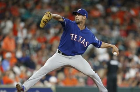 HOUSTON, TX – JULY 29: Mike Minor #36 of the Texas Rangers pitches in the first inning against the Houston Astros at Minute Maid Park on July 29, 2018 in Houston, Texas. (Photo by Bob Levey/Getty Images)