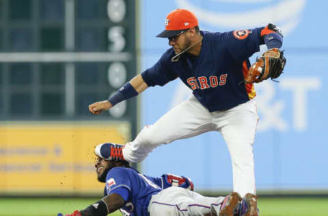 HOUSTON, TX – JULY 29: Yuli Gurriel #10 of the Houston Astros steps on the face of Jurickson Profar #19 of the Texas Rangers as he attempted to tag him sliding into second base in the sixth inning at Minute Maid Park on July 29, 2018 in Houston, Texas. (Photo by Bob Levey/Getty Images)