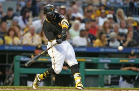 PITTSBURGH, PA – AUGUST 03: Josh Harrison #5 of the Pittsburgh Pirates hits an RBI single in the third inning against the St. Louis Cardinals at PNC Park on August 3, 2018 in Pittsburgh, Pennsylvania. (Photo by Justin K. Aller/Getty Images)